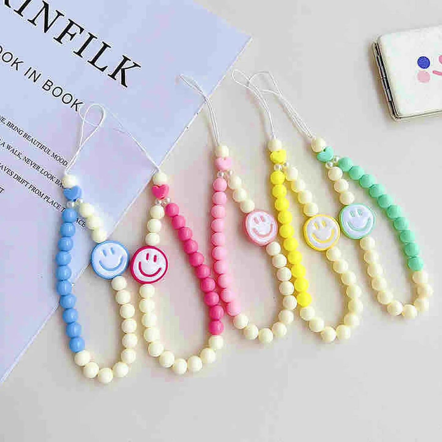 Phone charm with smiley