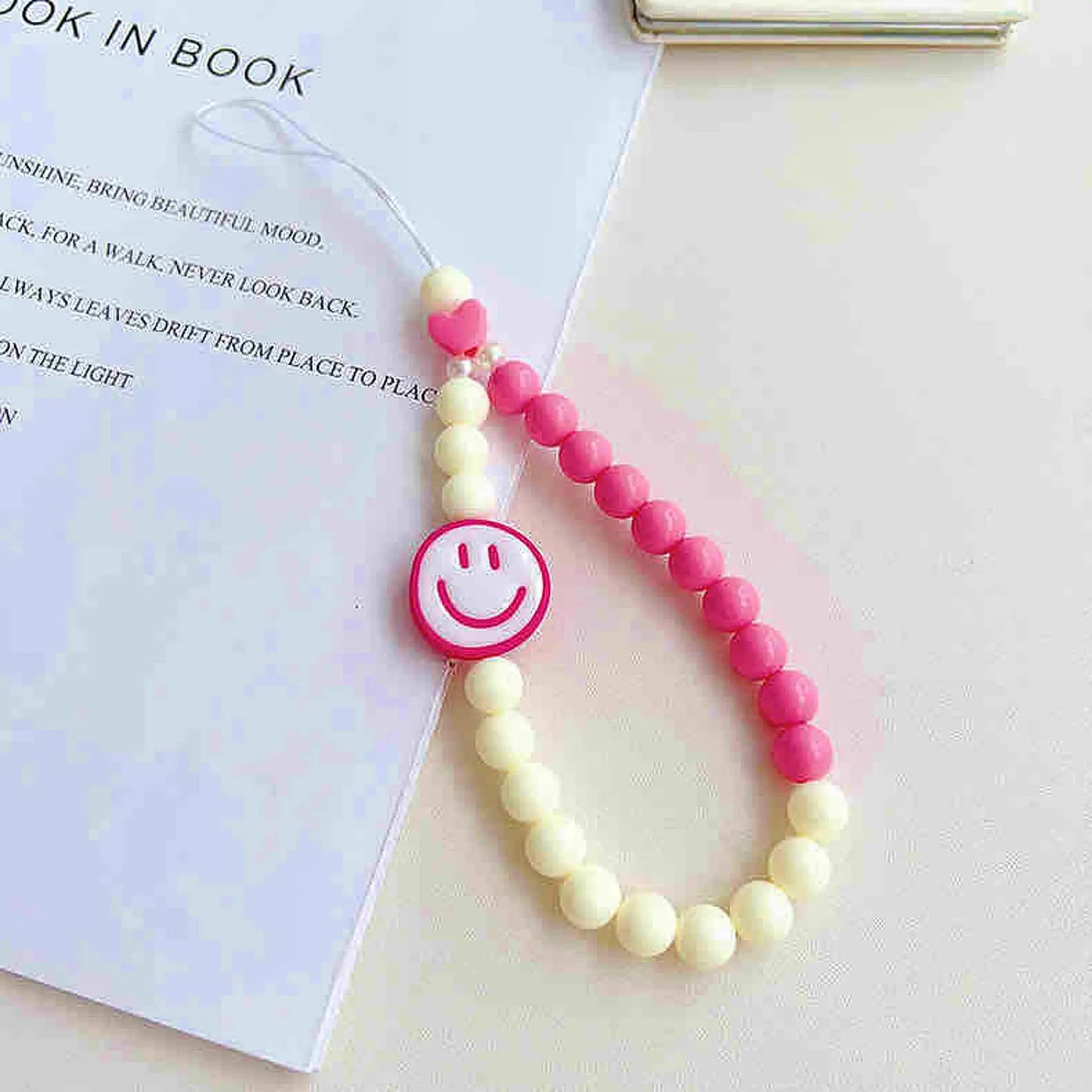Phone charm with smiley