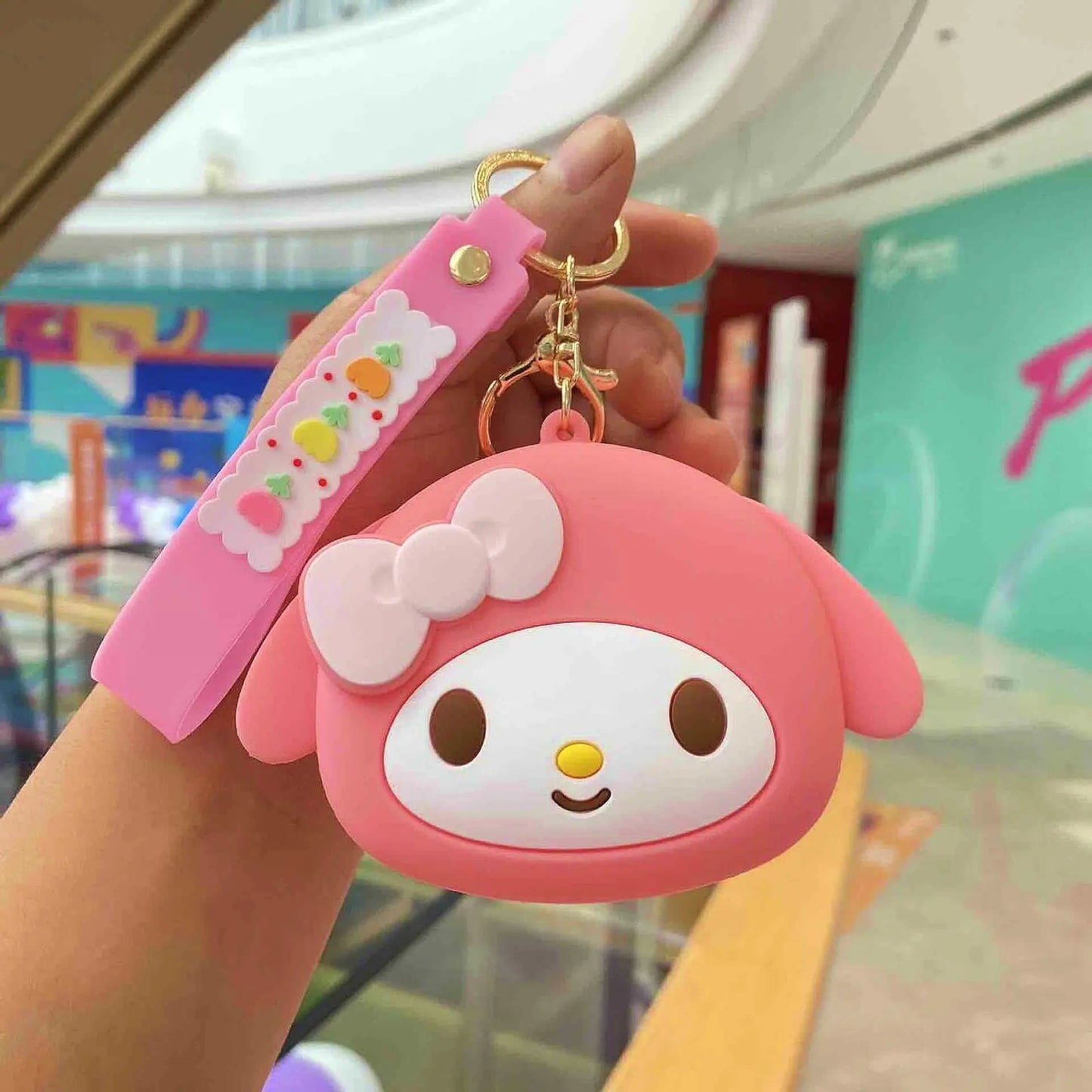 Key charm with pouch