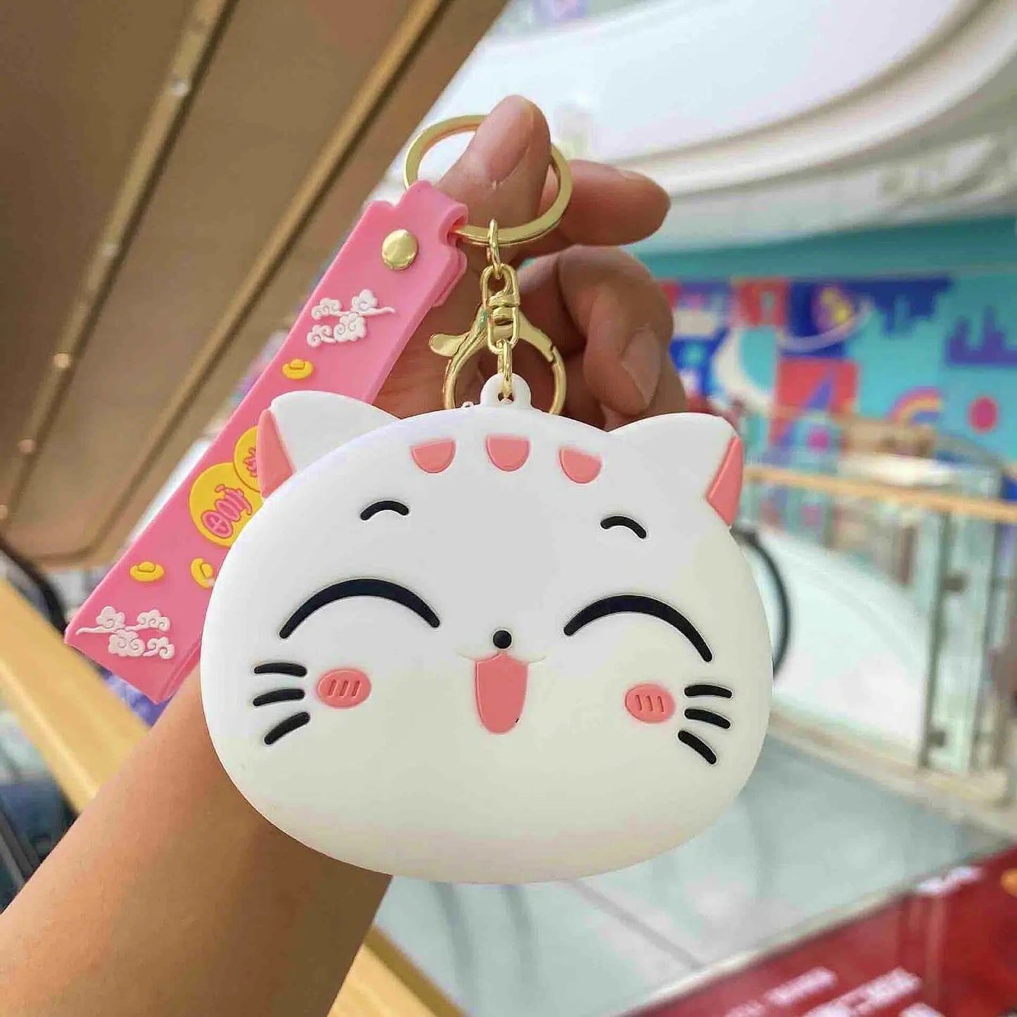 Key charm with pouch