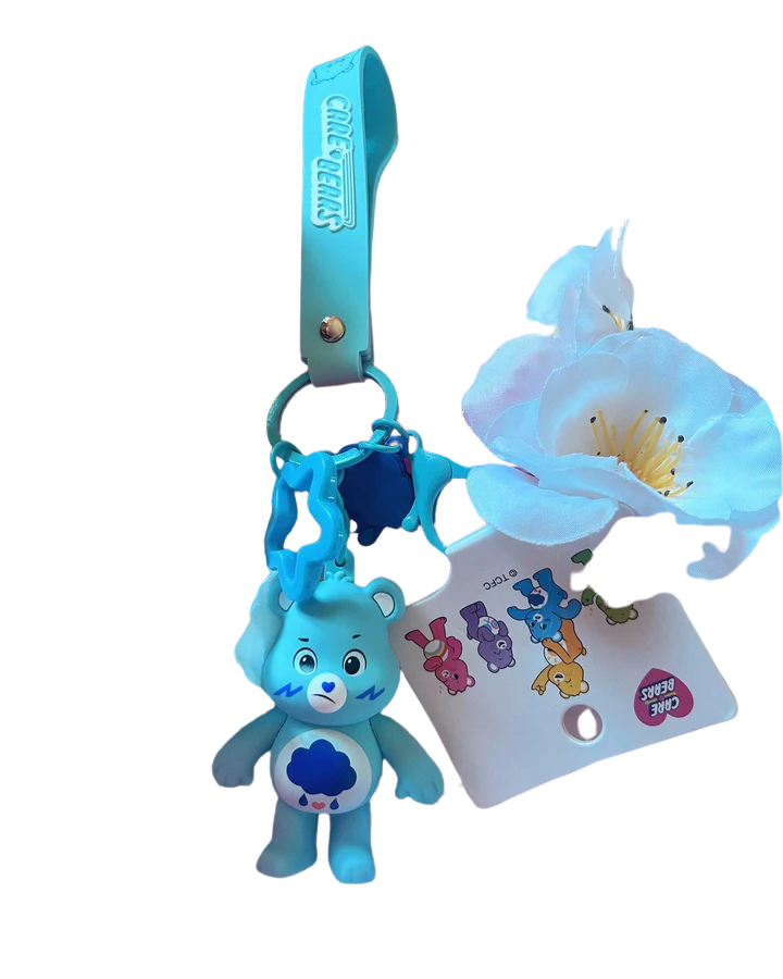 blue grumpy carebear keychain